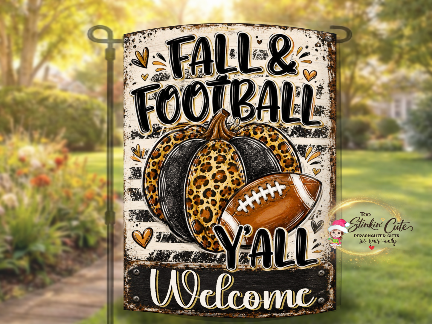 Black-and-white fall garden flag featuring a pumpkin and football