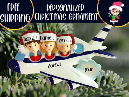Three-passenger airplane ornament with sample name, banner, and year labels shown against evergreen branches.