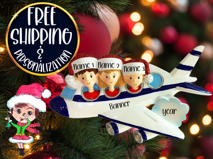Three-passenger airplane ornament with sample name labels shown against a Christmas tree and red ornaments.