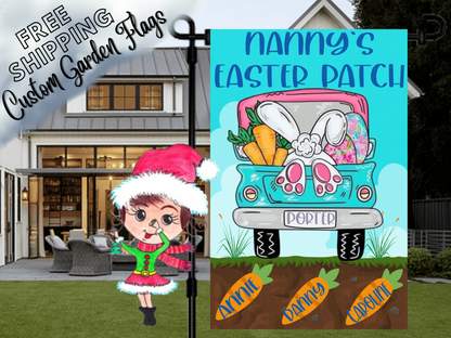 Nanny's Easter Patch garden flag with a turquoise truck, bunny feet and named carrots in soil in front of a porch.