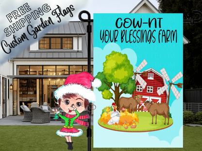 Turquoise Cow-nt Your Blessings Farm flag with cows, chickens and a red barn, shown in a close garden-stand view.