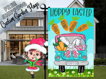 Happy Easter flag with a turquoise truck, bunny feet, eggs and named carrots, displayed in front of a porch.