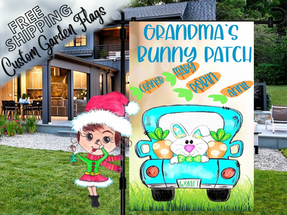 Grandma's Bunny Patch flag with a turquoise truck, bunny and named carrots, shown outside a house.