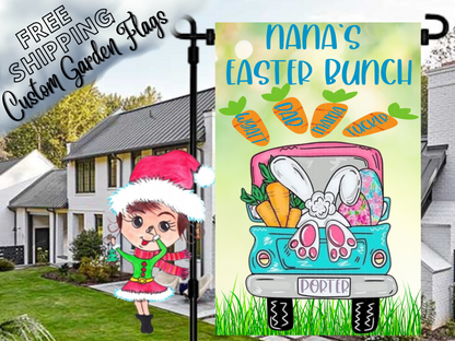Nana's Easter Bunch garden flag with a turquoise truck, bunny feet and named carrots in a daytime yard.