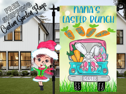 Nana's Easter Bunch garden flag with a turquoise truck, bunny feet and named carrots in a close garden-stand view.