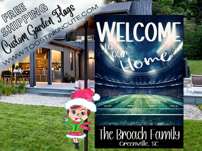 Welcome to Our Home garden flag with a lighted football stadium, green field, Broach family name and Greenville, SC text. Shown outside a house.