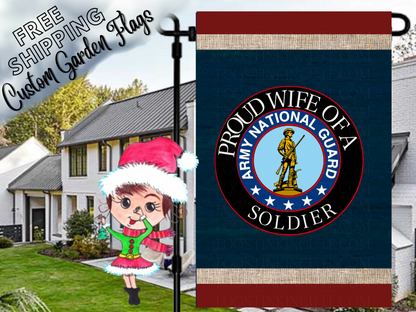 Proud Wife of a Soldier garden flag with Army National Guard emblem, navy background and red borders in a daytime yard.