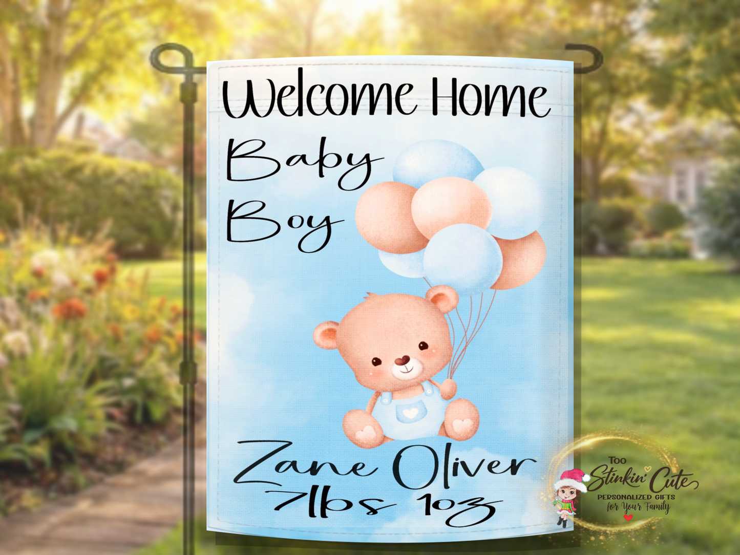 Personalized baby boy yard décor featuring teddy bear and welcome home message