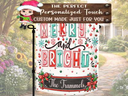 Bright Christmas garden flag with colorful typography and festive winter accents for porches, patios, walkways, gardens, and flower beds.