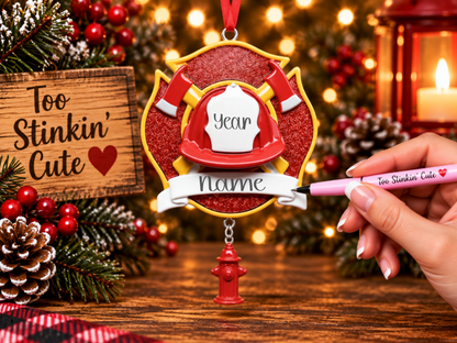 Custom fireman ornament featuring crossed axes and a dangling fire hydrant