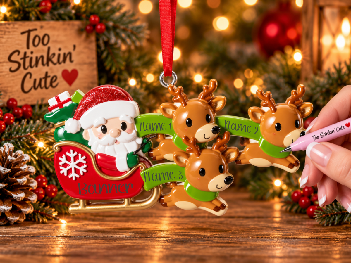 Santa in a bright red sleigh decorated with a white snowflake and golden trim.