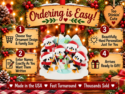 Penguin family ornament with white Santa hat brims and a blank white base for handwritten personalization.