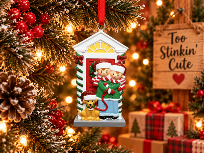 Couple with dog holiday keepsake wearing Santa hats and striped scarves