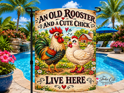 Old Rooster and Cute Chick garden flag featuring a colorful rooster and hen wearing red high heels.