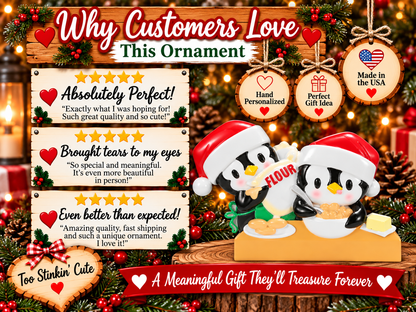 Penguin baking Christmas ornament hanging from a red ribbon against warm holiday lights.