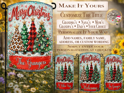 Custom family name Christmas yard flag with bold red Merry Christmas lettering, snowy details, holly accents, hearts, and four colorful decorated holiday trees.