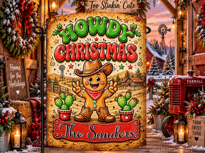 Personalized Howdy Christmas garden flag featuring a smiling gingerbread cowboy, festive cactus plants, and a custom family name plaque.