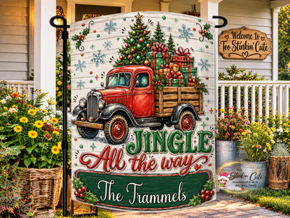 Personalized Jingle All the Way Christmas garden flag featuring a vintage red truck carrying a decorated Christmas tree and colorful wrapped presents.