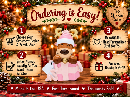 Pink reindeer gift box ornament featuring a blank white tag for handwritten personalization.