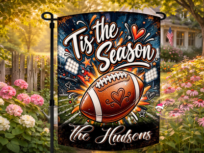 Personalized ’Tis the Season football garden flag featuring the Hudsons family name
