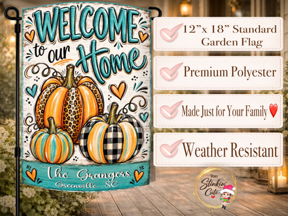 Welcome to Our Home outdoor flag featuring fashionable patterned pumpkins and turquoise heart embellishments.