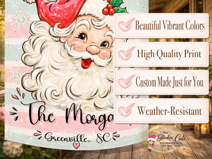 Personalized pink Christmas garden flag featuring Santa, snowflakes, holly and hearts