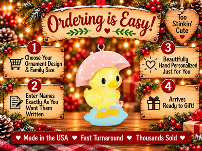 Yellow duck with pink umbrella ornament showing the blank areas available for hand personalization.