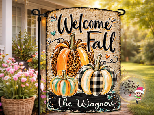 Personalized Welcome Fall garden flag with leopard-print and buffalo-plaid pumpkins and a custom family name.