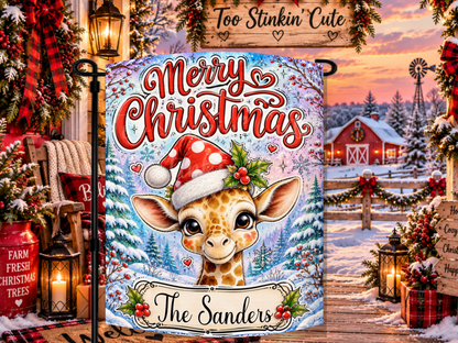 Personalized Merry Christmas garden flag featuring a cute giraffe in a red polka-dot Santa hat and a custom family name.