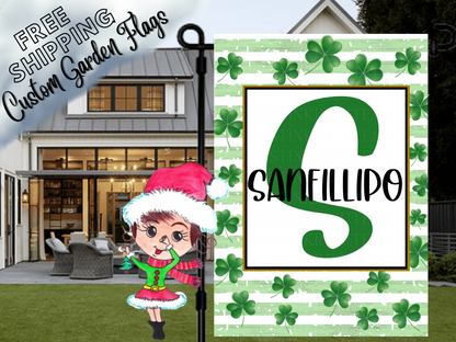 St. Patrick's Day garden flag mockup with green shamrocks, stripes, a large green S and family-name lettering.