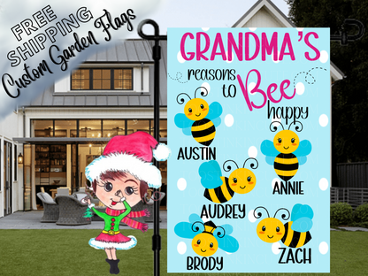Grandma's reasons to bee happy garden flag mockup with named bees and white polka dots on a light blue background.