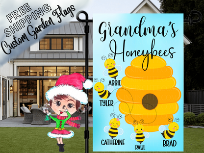Grandma's Honeybees garden flag mockup with a golden beehive and named bees on a blue background.