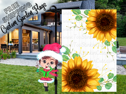 Garden flag mockup with large yellow sunflowers on white wood print and green leafy accents.