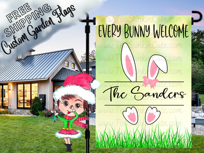 Every Bunny Welcome garden flag mockup with white bunny ears and feet, pink bow and Sanders family name.