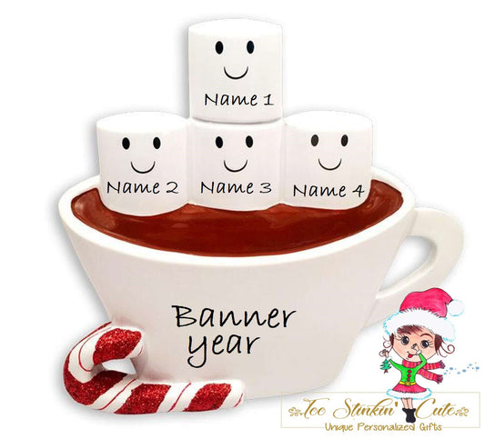 Family of 4 table topper with smiling marshmallows in a white cocoa cup. Sample personalization labels are shown.