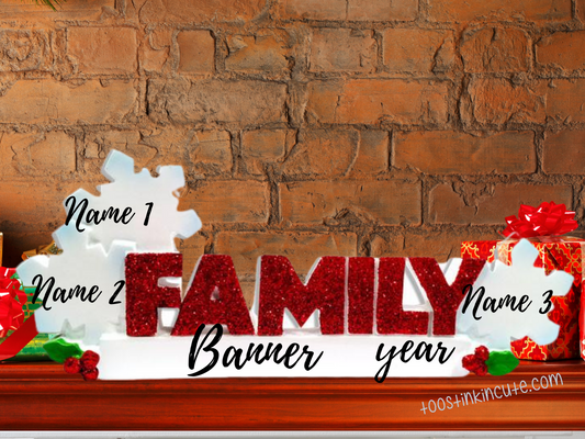 Family of 3 table topper with white snowflakes above glittery red FAMILY lettering. Sample personalization labels are shown.